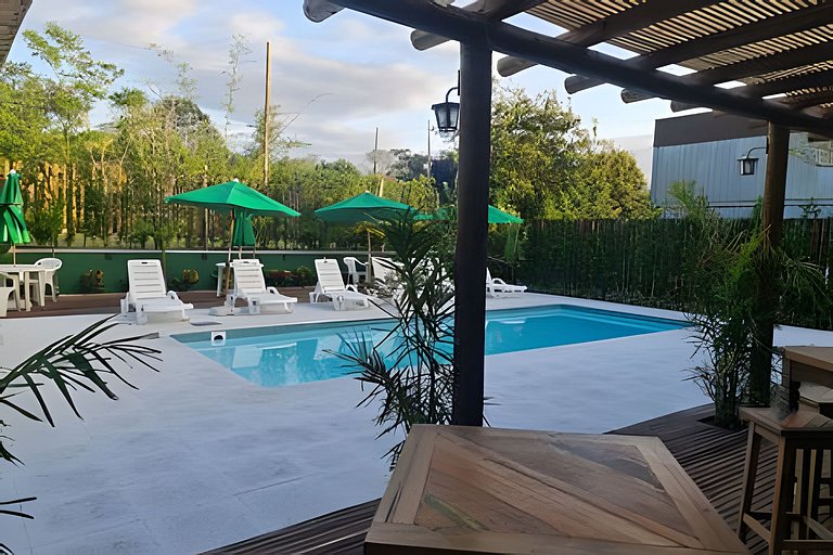 CASA 17 TOP no meio das árvores
